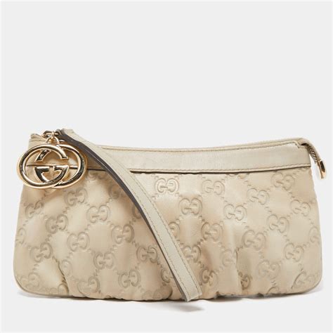 gucci guccissima wristlet|clutch gucci original.